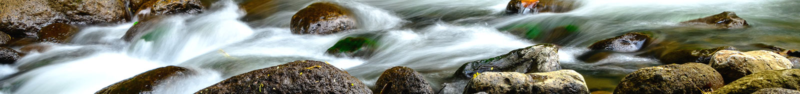 water stream over rocks