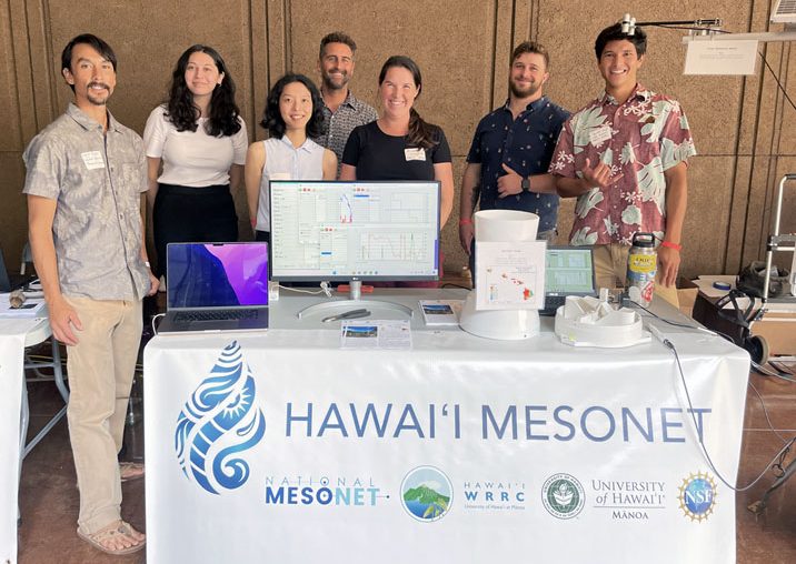 Researchers & technicians at the Mesonet booth for UH Res Day