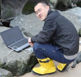 Xialong with laptop